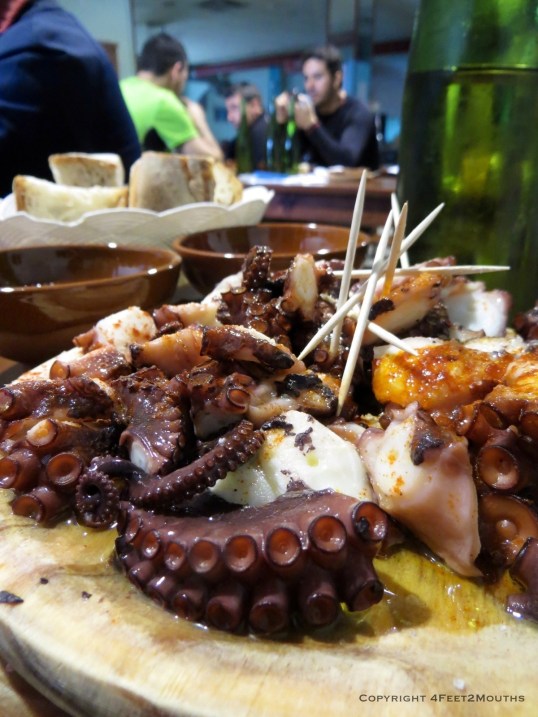 One of the best meals on the Camino, broiled octopus with chunks of bread and bowls of white wine