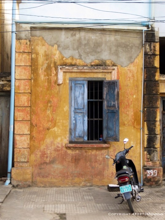 Old window with scooter