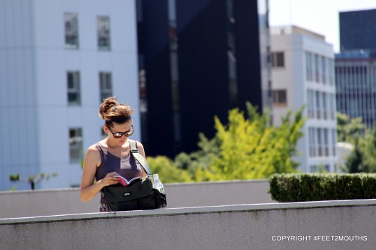 Me checking out my guidebook in Tokyo (2009)