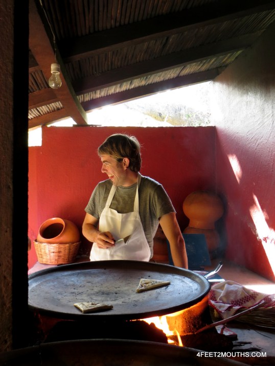 Nathan entertaining classmates while making tetelas
